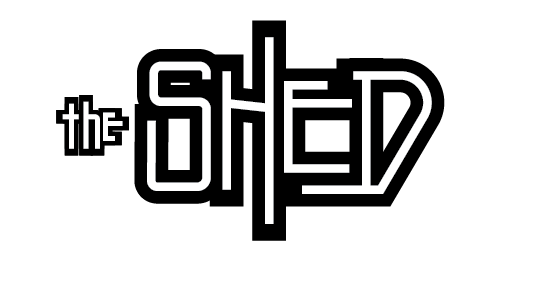 A black and white logo for the shed restaurant.
